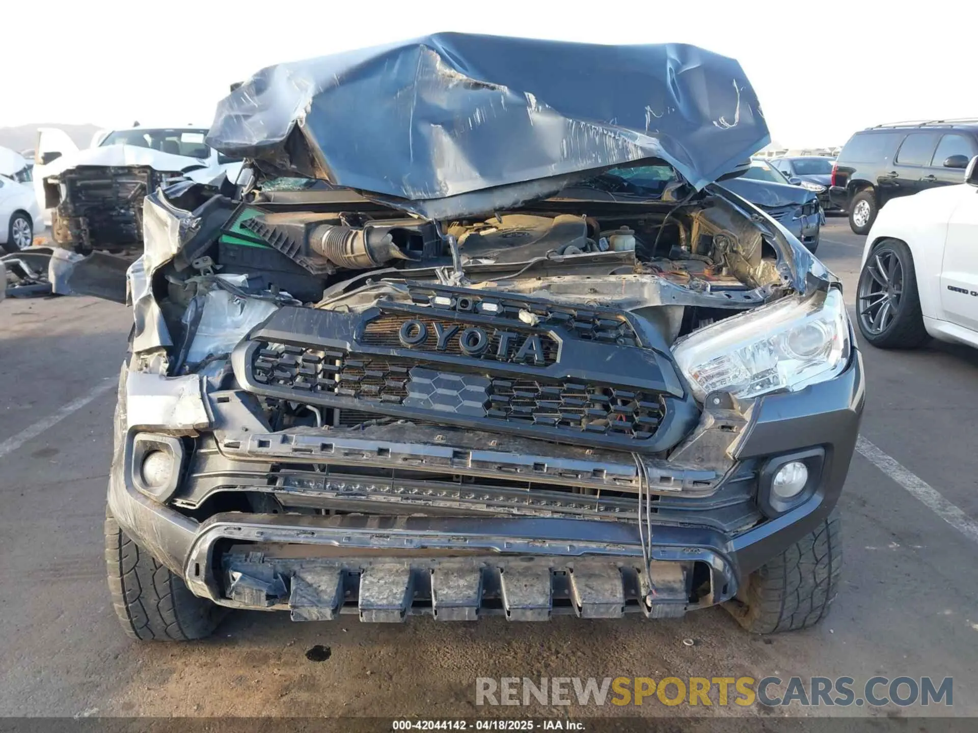 6 Photograph of a damaged car 3TMAZ5CN0KM104096 TOYOTA TACOMA 2019