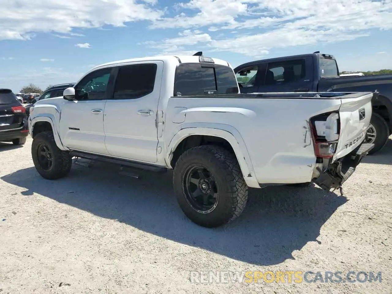 2 Photograph of a damaged car 3TMAZ5CN0KM104356 TOYOTA TACOMA 2019
