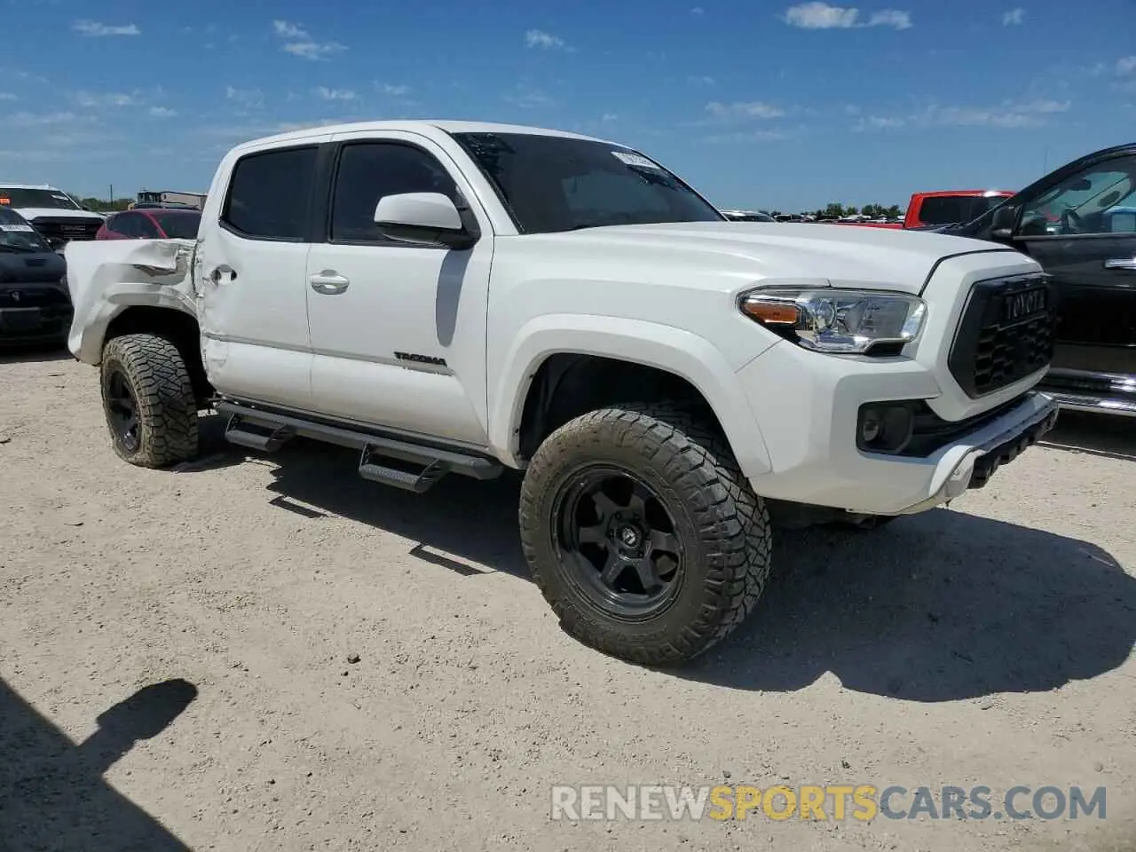 4 Photograph of a damaged car 3TMAZ5CN0KM104356 TOYOTA TACOMA 2019