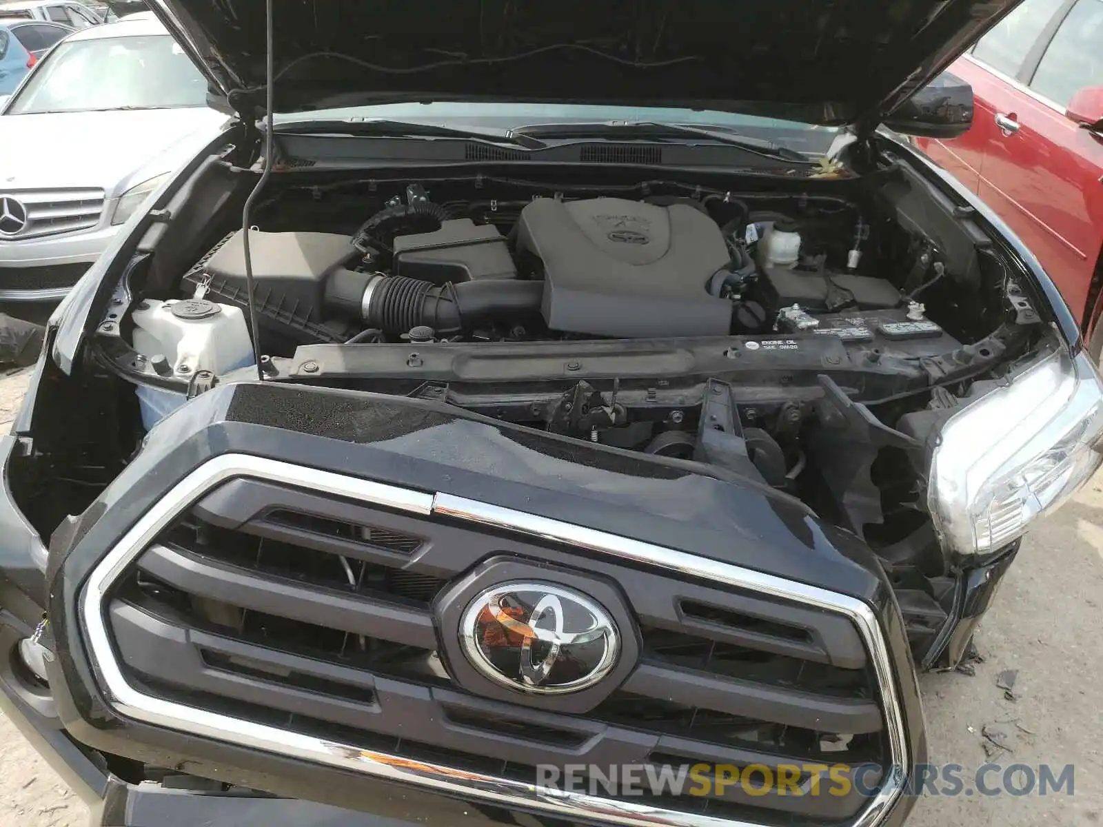 7 Photograph of a damaged car 3TMAZ5CN1KM086241 TOYOTA TACOMA 2019