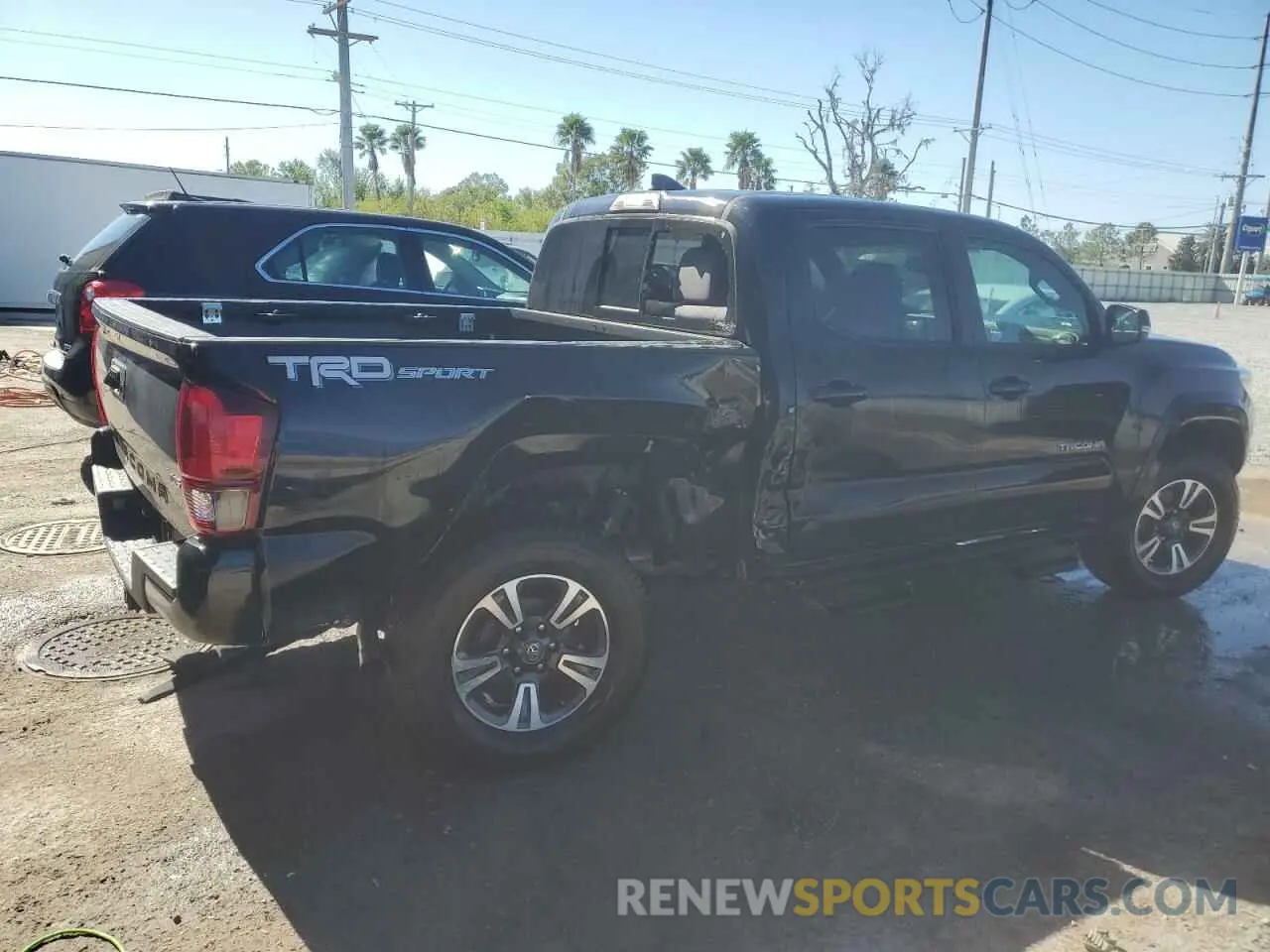 3 Photograph of a damaged car 3TMAZ5CN1KM095571 TOYOTA TACOMA 2019