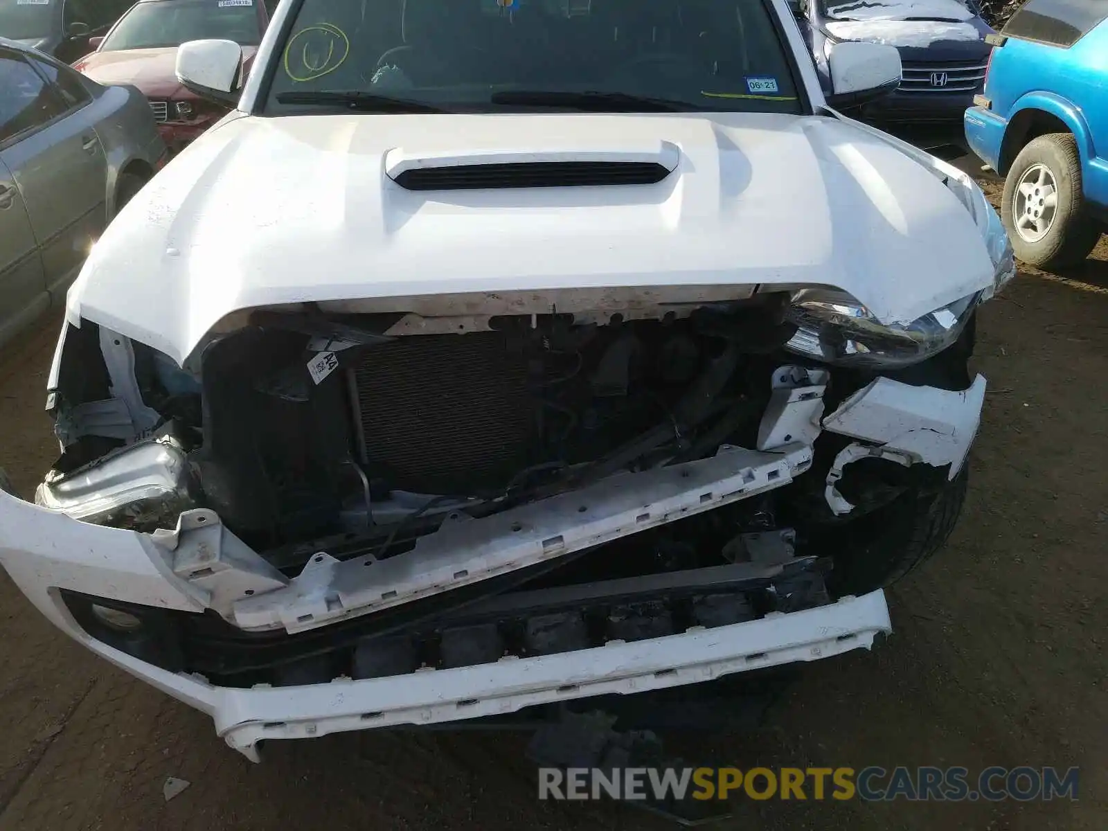 7 Photograph of a damaged car 3TMAZ5CN1KM095778 TOYOTA TACOMA 2019