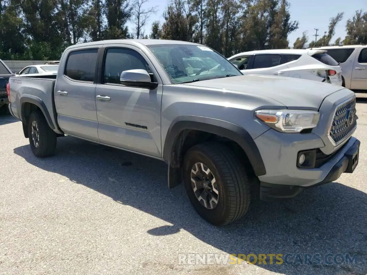 4 Photograph of a damaged car 3TMAZ5CN1KM097143 TOYOTA TACOMA 2019