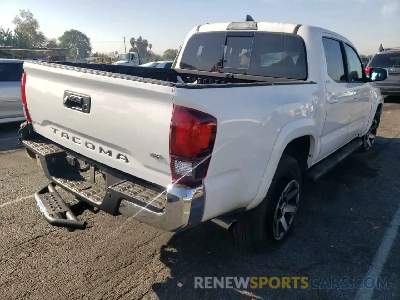 4 Photograph of a damaged car 3TMAZ5CN1KM100705 TOYOTA TACOMA 2019