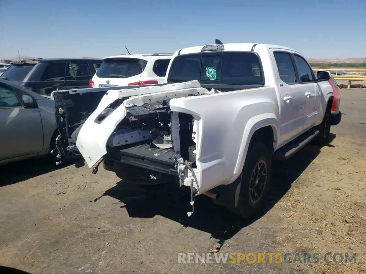 4 Photograph of a damaged car 3TMAZ5CN1KM101370 TOYOTA TACOMA 2019