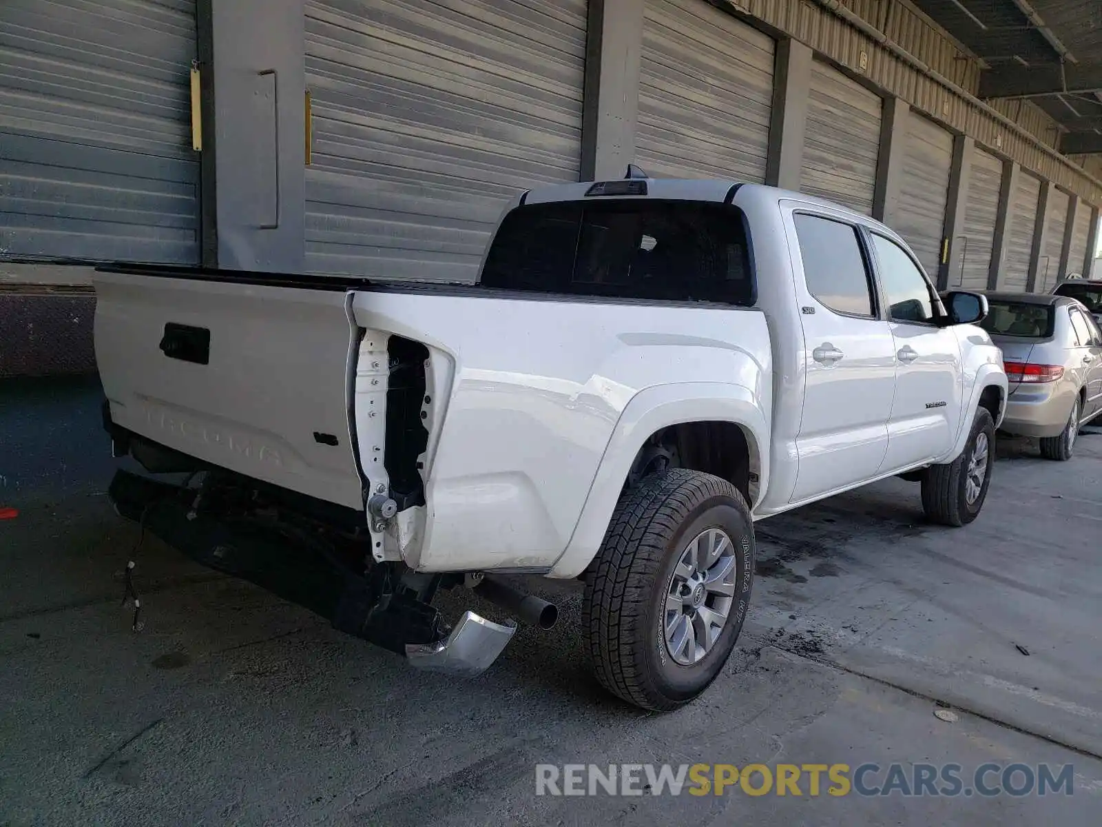 4 Photograph of a damaged car 3TMAZ5CN1KM105192 TOYOTA TACOMA 2019