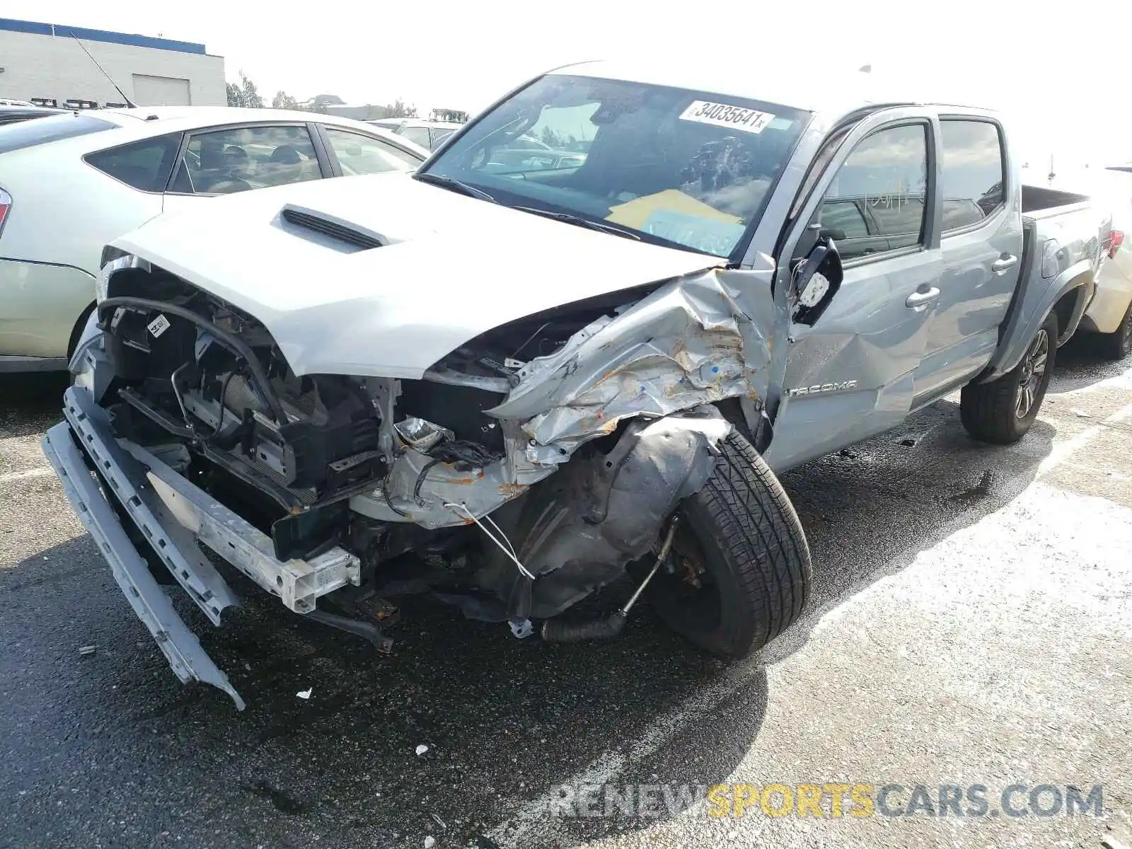 2 Photograph of a damaged car 3TMAZ5CN1KM106665 TOYOTA TACOMA 2019