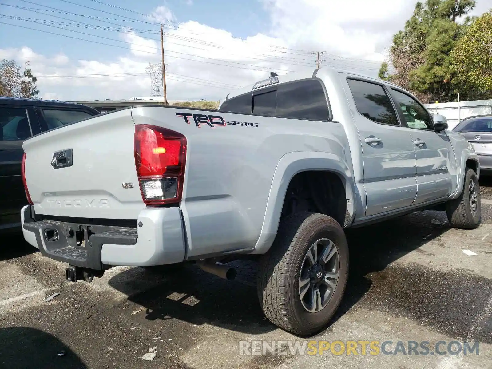 4 Photograph of a damaged car 3TMAZ5CN1KM106665 TOYOTA TACOMA 2019