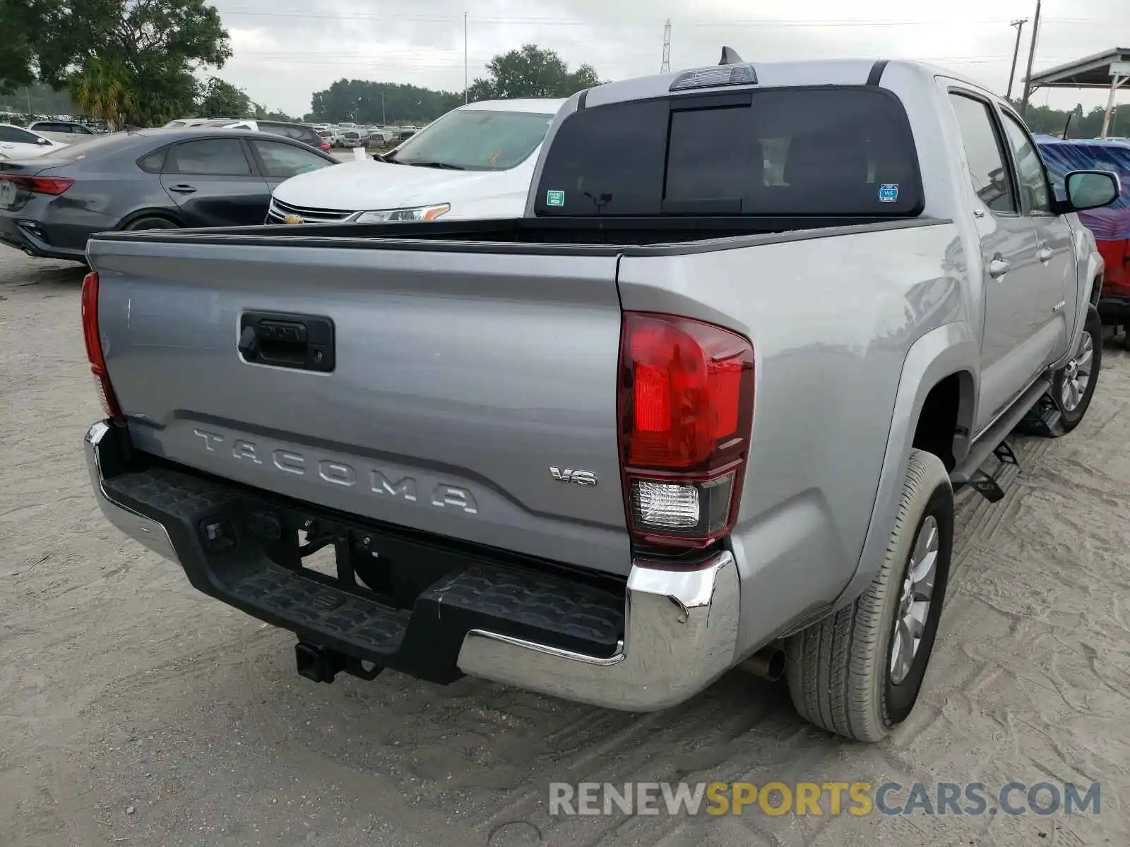 4 Photograph of a damaged car 3TMAZ5CN2KM084255 TOYOTA TACOMA 2019