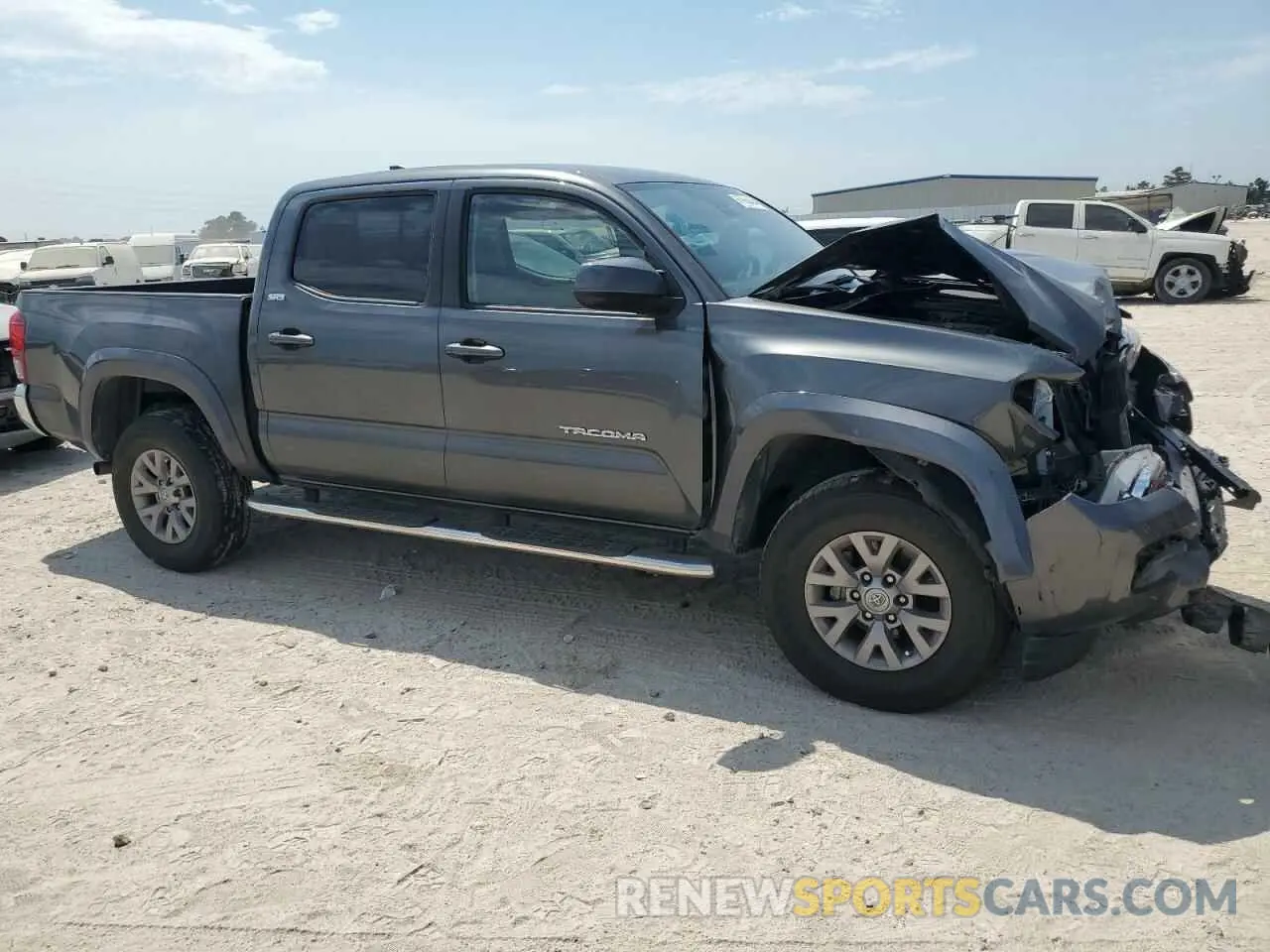 4 Photograph of a damaged car 3TMAZ5CN2KM097622 TOYOTA TACOMA 2019