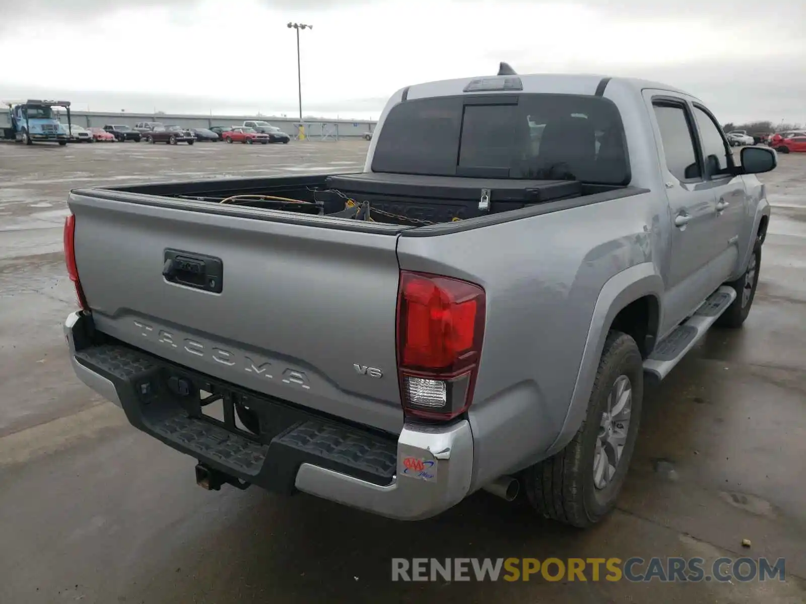 4 Photograph of a damaged car 3TMAZ5CN2KM105735 TOYOTA TACOMA 2019