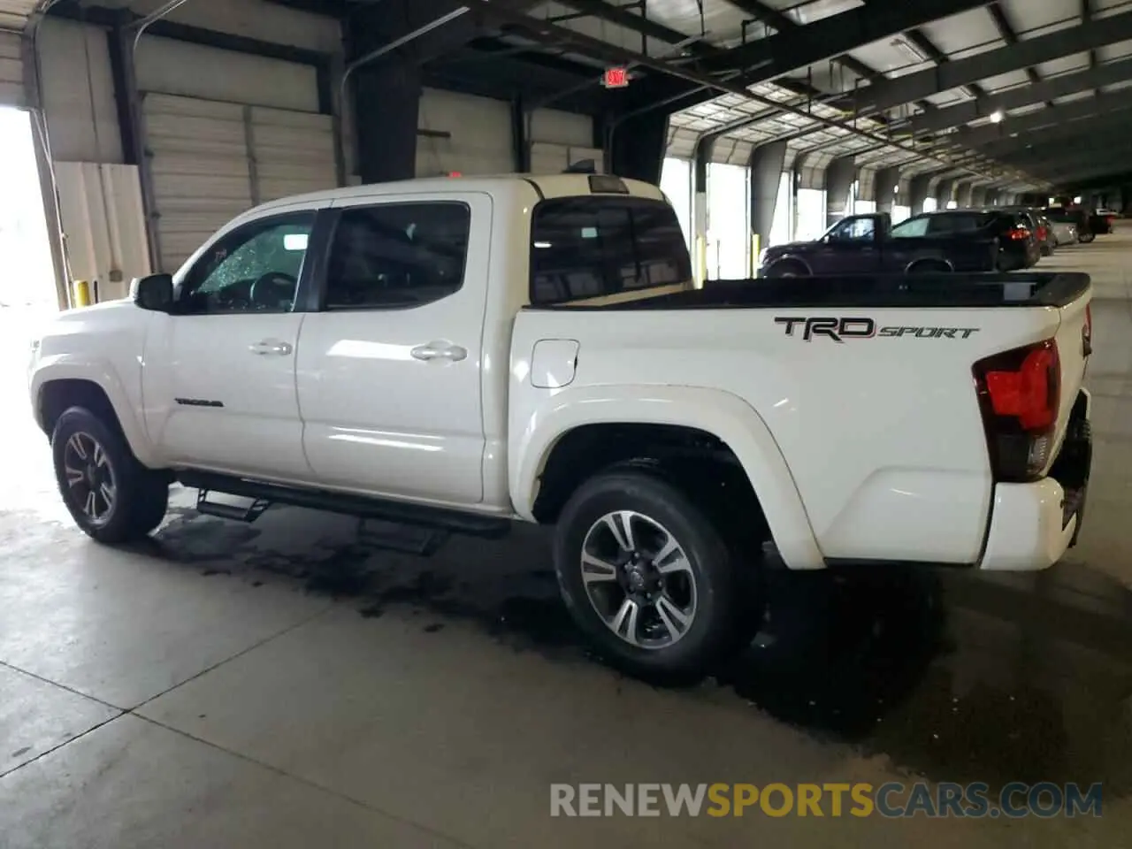 2 Photograph of a damaged car 3TMAZ5CN3KM087911 TOYOTA TACOMA 2019