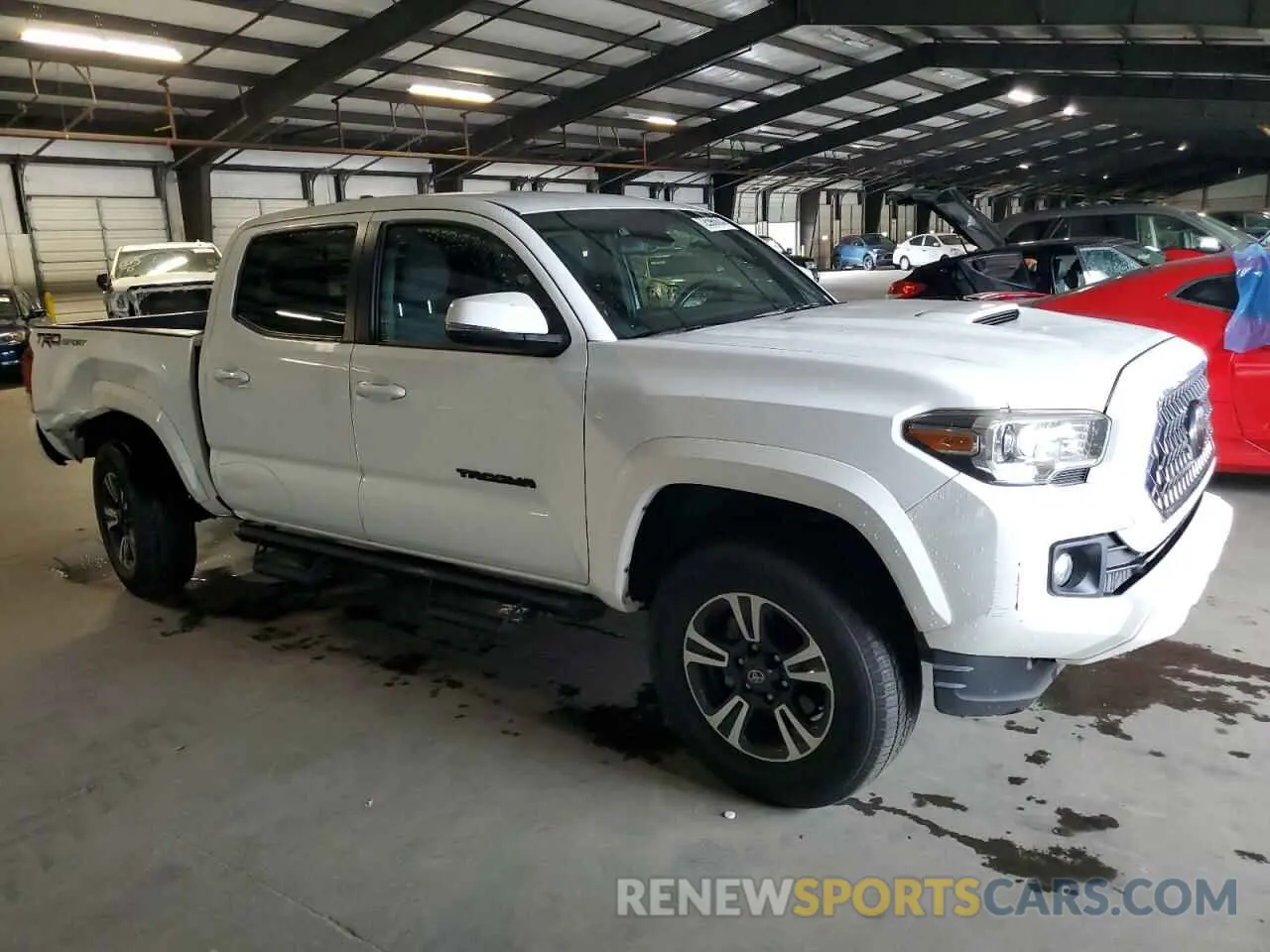 4 Photograph of a damaged car 3TMAZ5CN3KM087911 TOYOTA TACOMA 2019