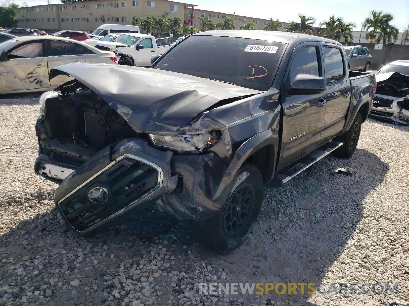 2 Photograph of a damaged car 3TMAZ5CN3KM094387 TOYOTA TACOMA 2019