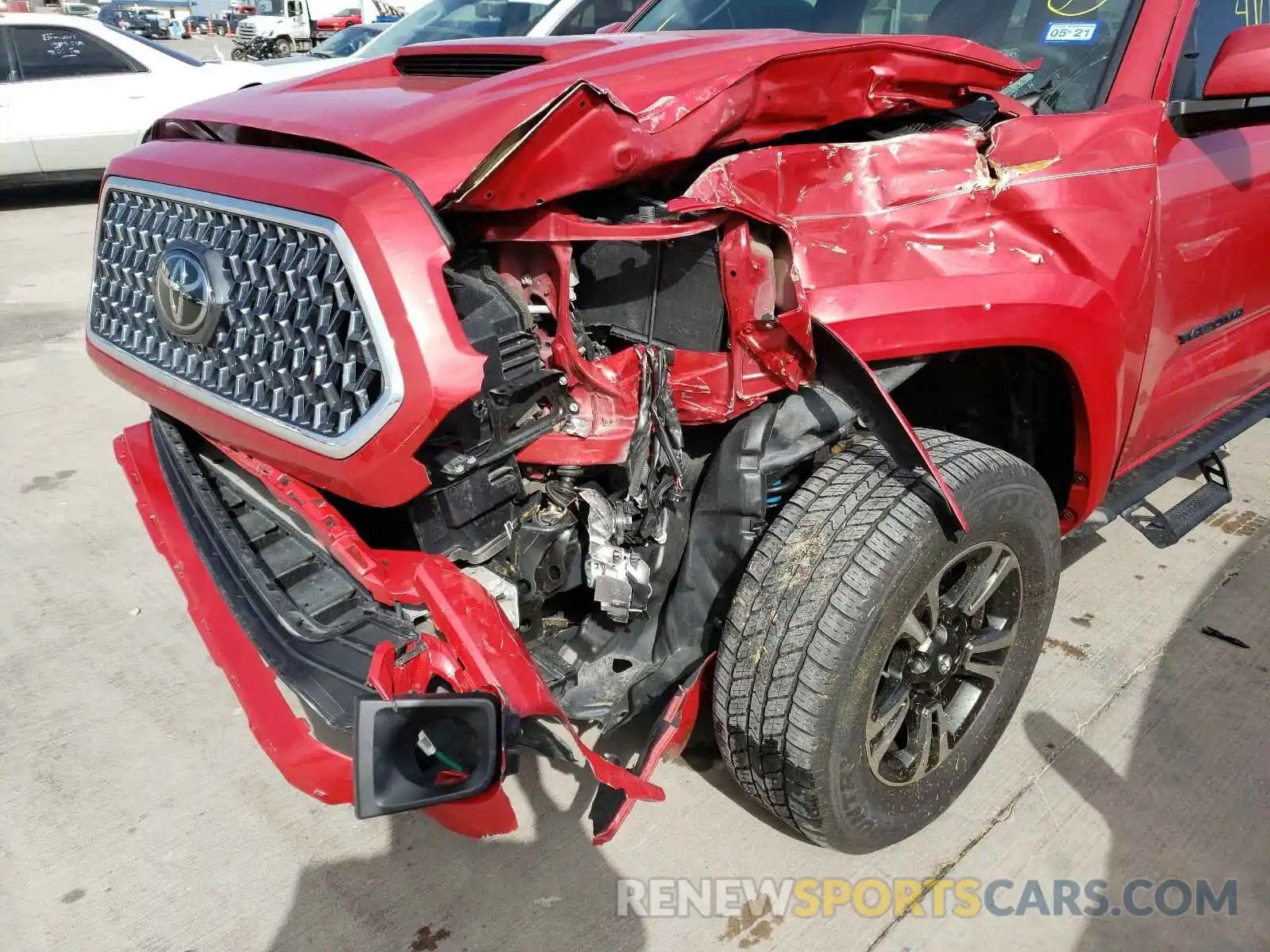 9 Photograph of a damaged car 3TMAZ5CN3KM103900 TOYOTA TACOMA 2019