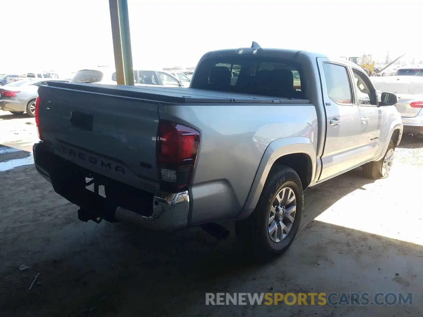 4 Photograph of a damaged car 3TMAZ5CN3KM105095 TOYOTA TACOMA 2019