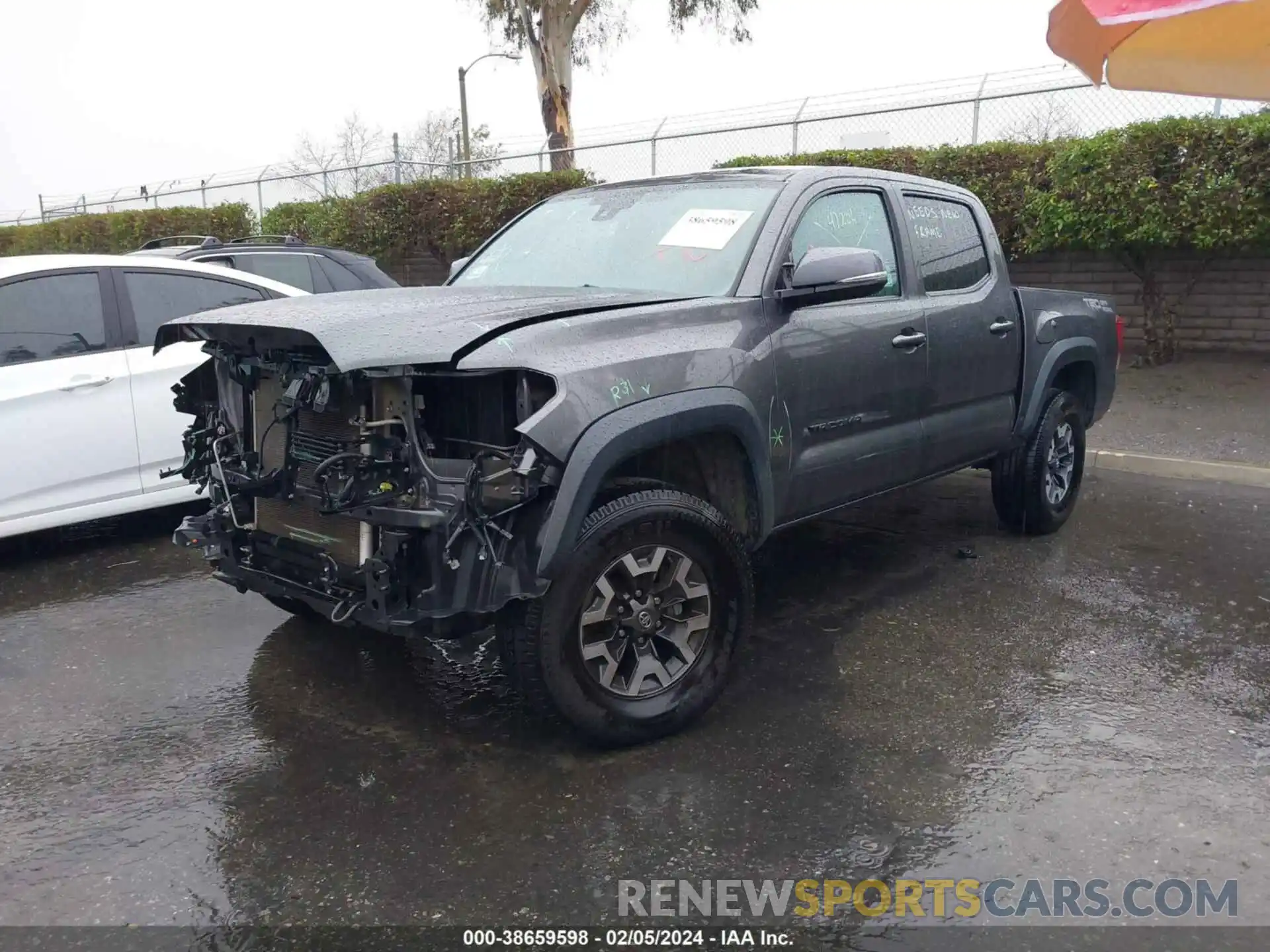 2 Photograph of a damaged car 3TMAZ5CN4KM097864 TOYOTA TACOMA 2019