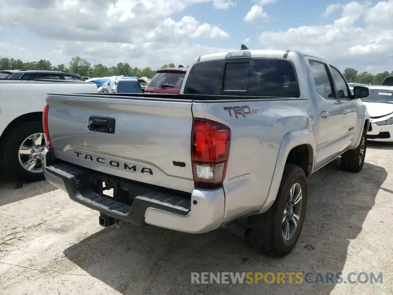 4 Photograph of a damaged car 3TMAZ5CN5KM097517 TOYOTA TACOMA 2019