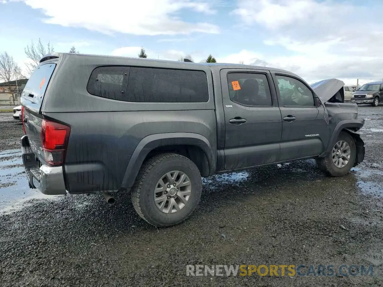 3 Photograph of a damaged car 3TMAZ5CN5KM102604 TOYOTA TACOMA 2019