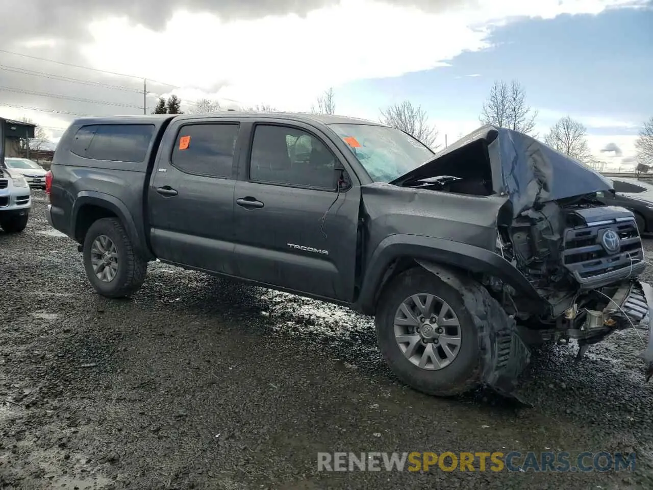 4 Photograph of a damaged car 3TMAZ5CN5KM102604 TOYOTA TACOMA 2019