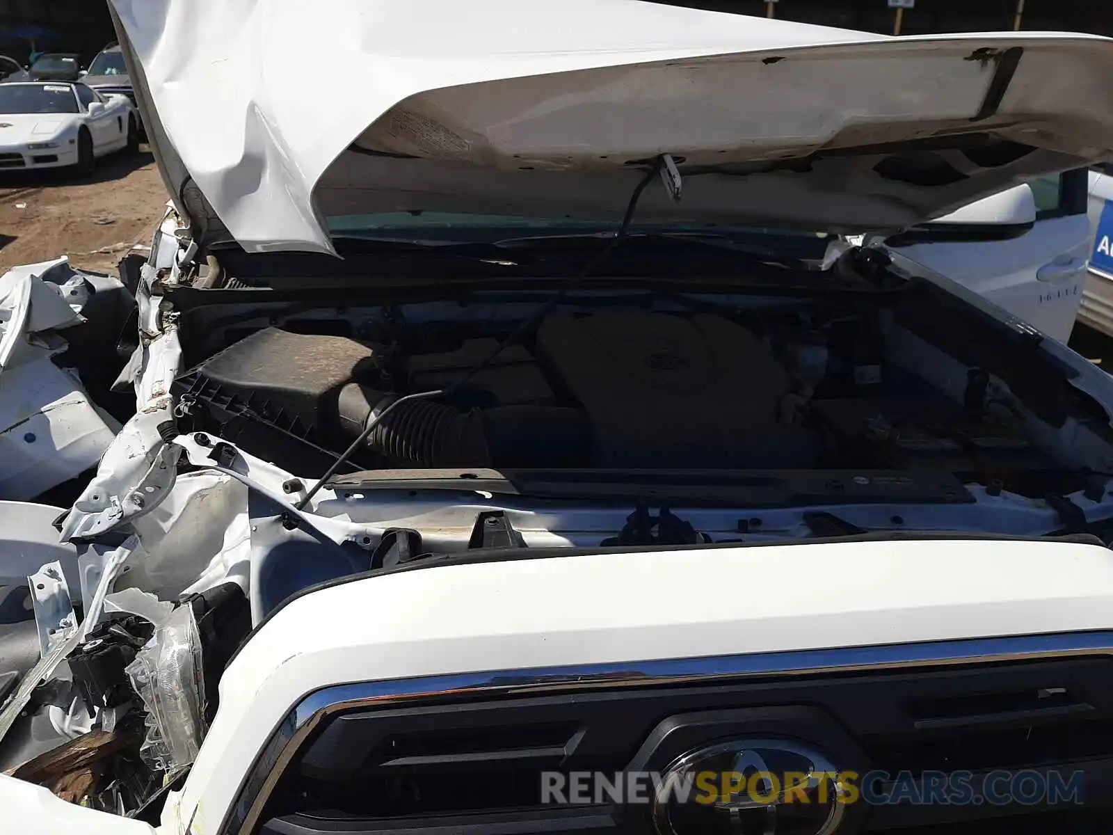 7 Photograph of a damaged car 3TMAZ5CN6KM084159 TOYOTA TACOMA 2019