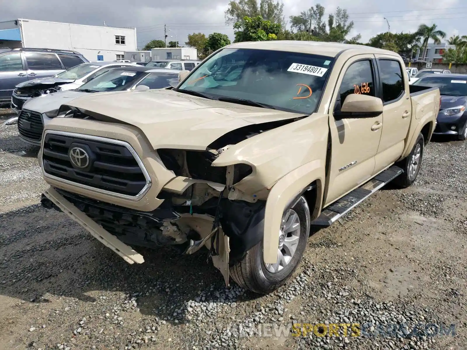 2 Photograph of a damaged car 3TMAZ5CN6KM096845 TOYOTA TACOMA 2019