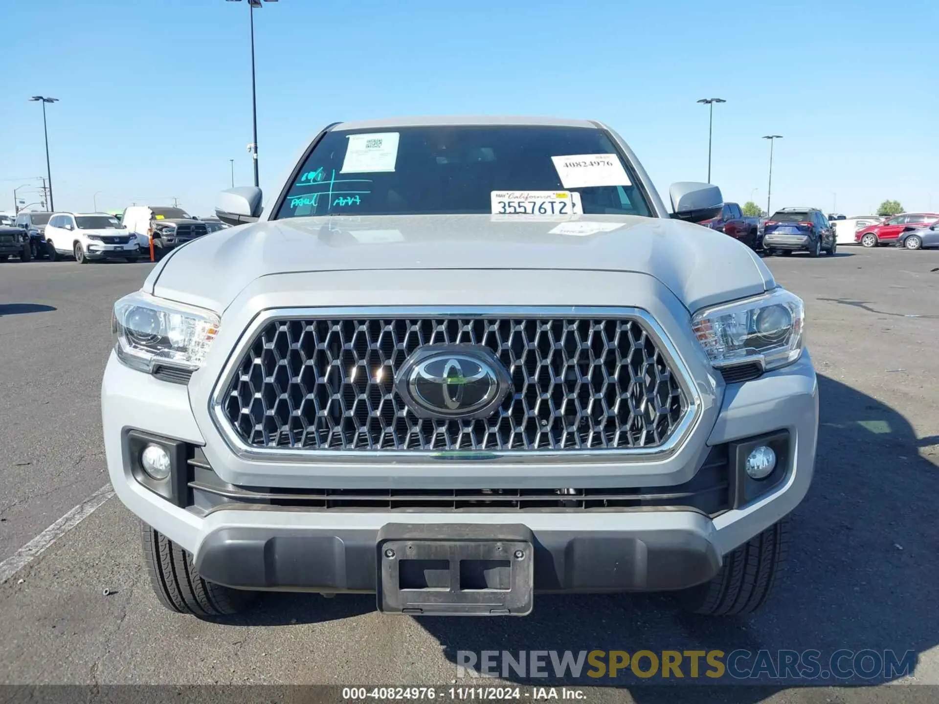 12 Photograph of a damaged car 3TMAZ5CN6KM101395 TOYOTA TACOMA 2019
