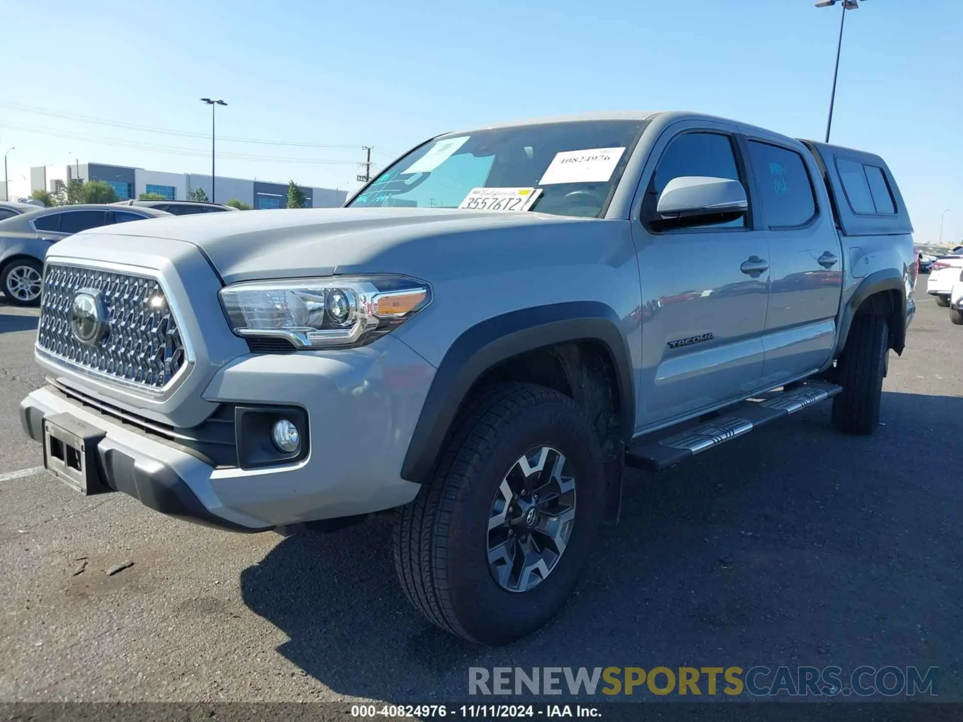 2 Photograph of a damaged car 3TMAZ5CN6KM101395 TOYOTA TACOMA 2019