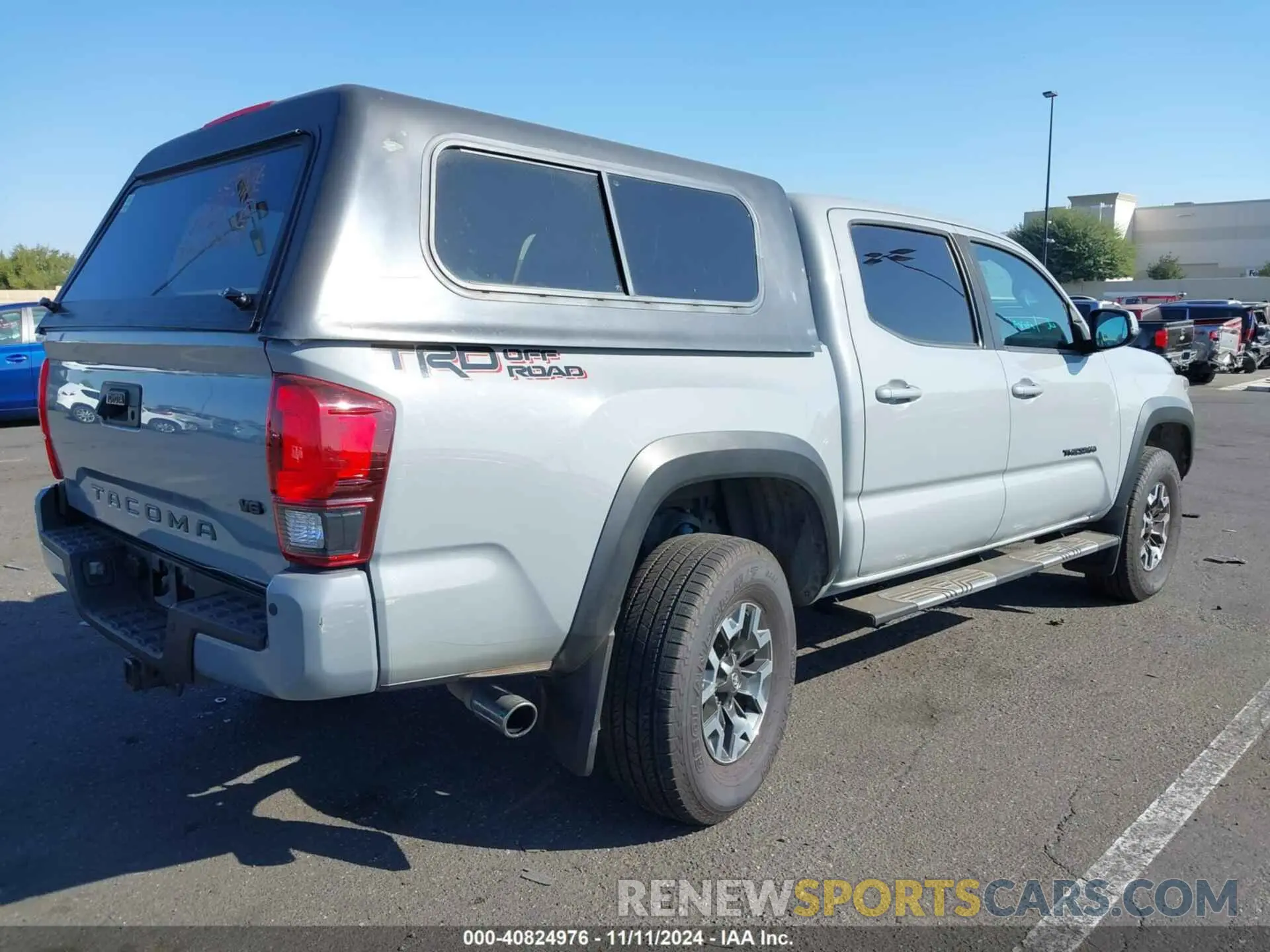 4 Photograph of a damaged car 3TMAZ5CN6KM101395 TOYOTA TACOMA 2019