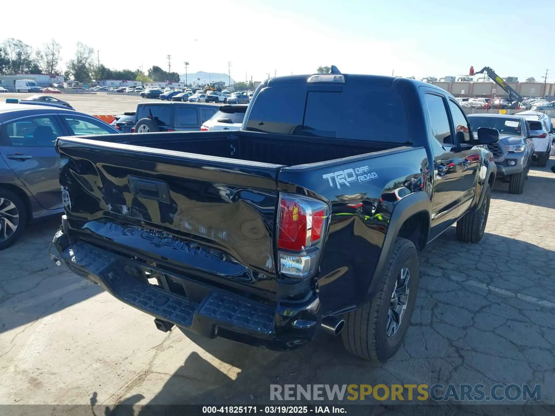 4 Photograph of a damaged car 3TMAZ5CN6KM105771 TOYOTA TACOMA 2019