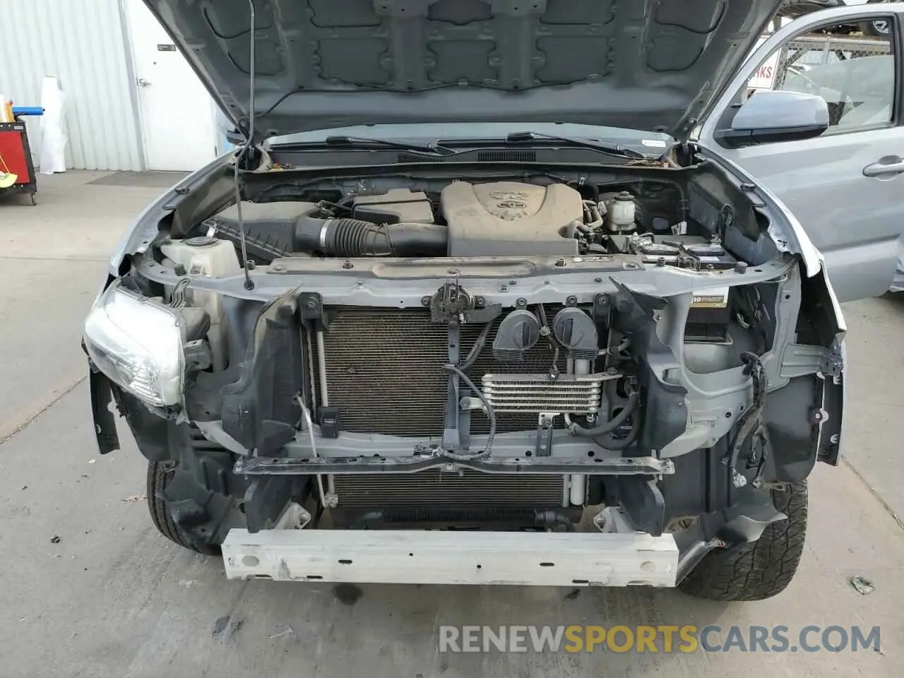 11 Photograph of a damaged car 3TMAZ5CN6KM106662 TOYOTA TACOMA 2019