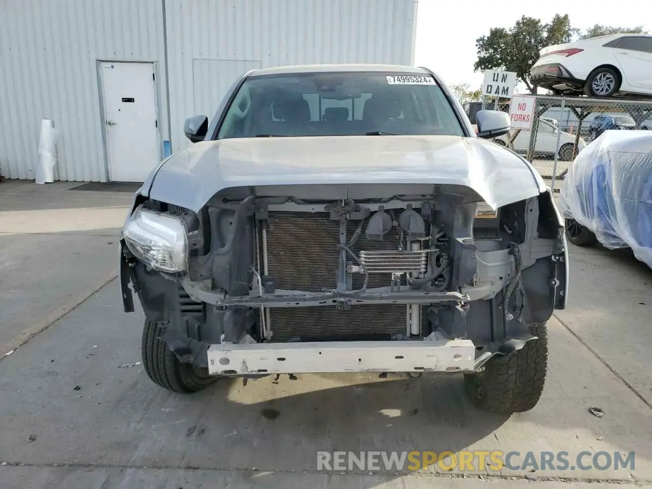 5 Photograph of a damaged car 3TMAZ5CN6KM106662 TOYOTA TACOMA 2019