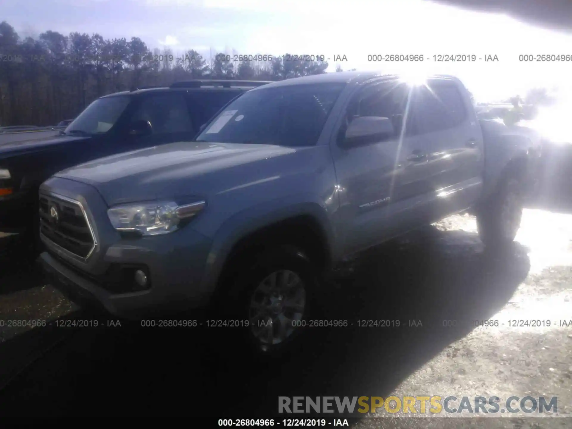 2 Photograph of a damaged car 3TMAZ5CN6KM108489 TOYOTA TACOMA 2019