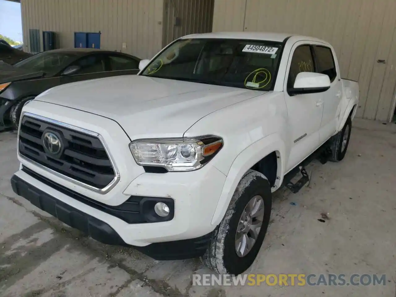 2 Photograph of a damaged car 3TMAZ5CN6KM111229 TOYOTA TACOMA 2019