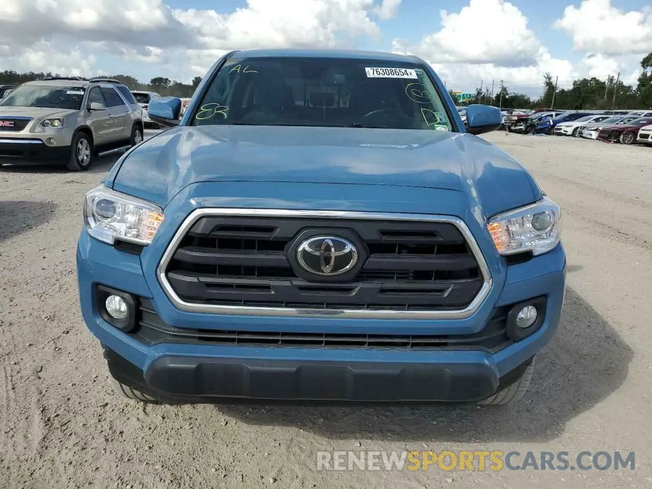 5 Photograph of a damaged car 3TMAZ5CN6KM112381 TOYOTA TACOMA 2019