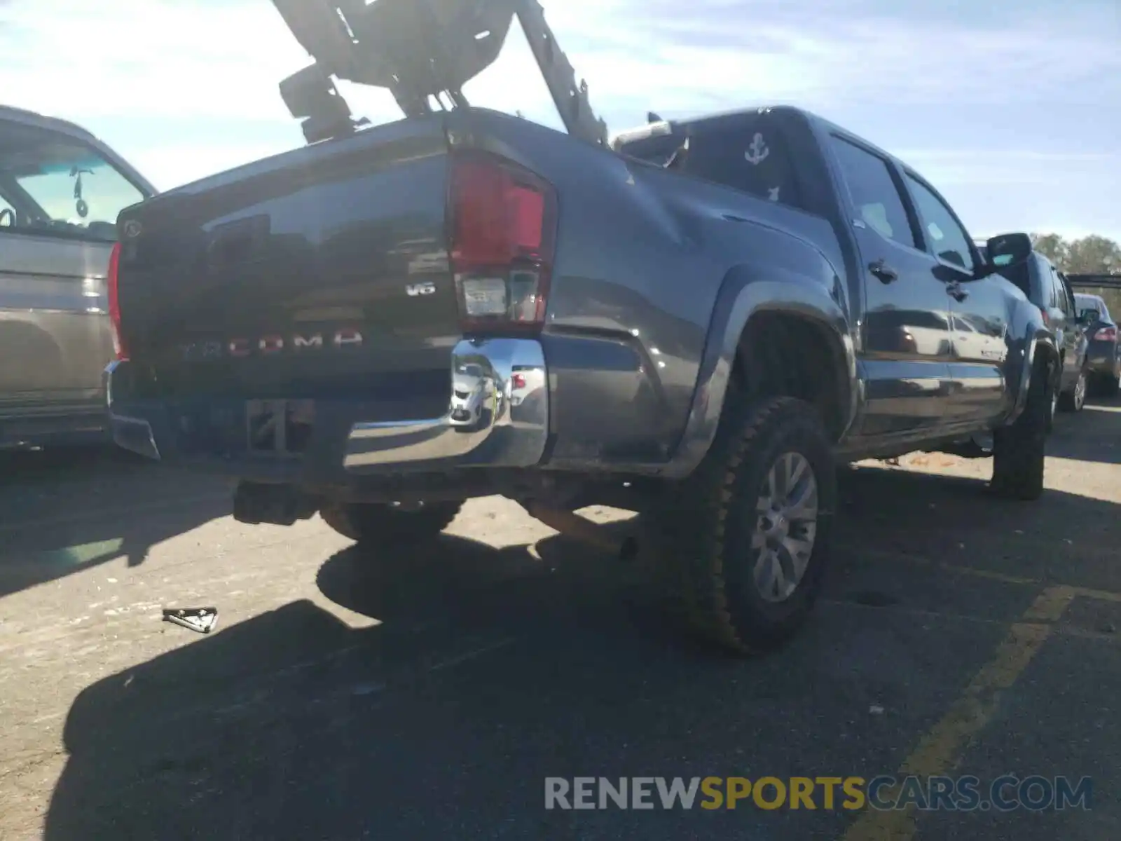 4 Photograph of a damaged car 3TMAZ5CN7KM081500 TOYOTA TACOMA 2019