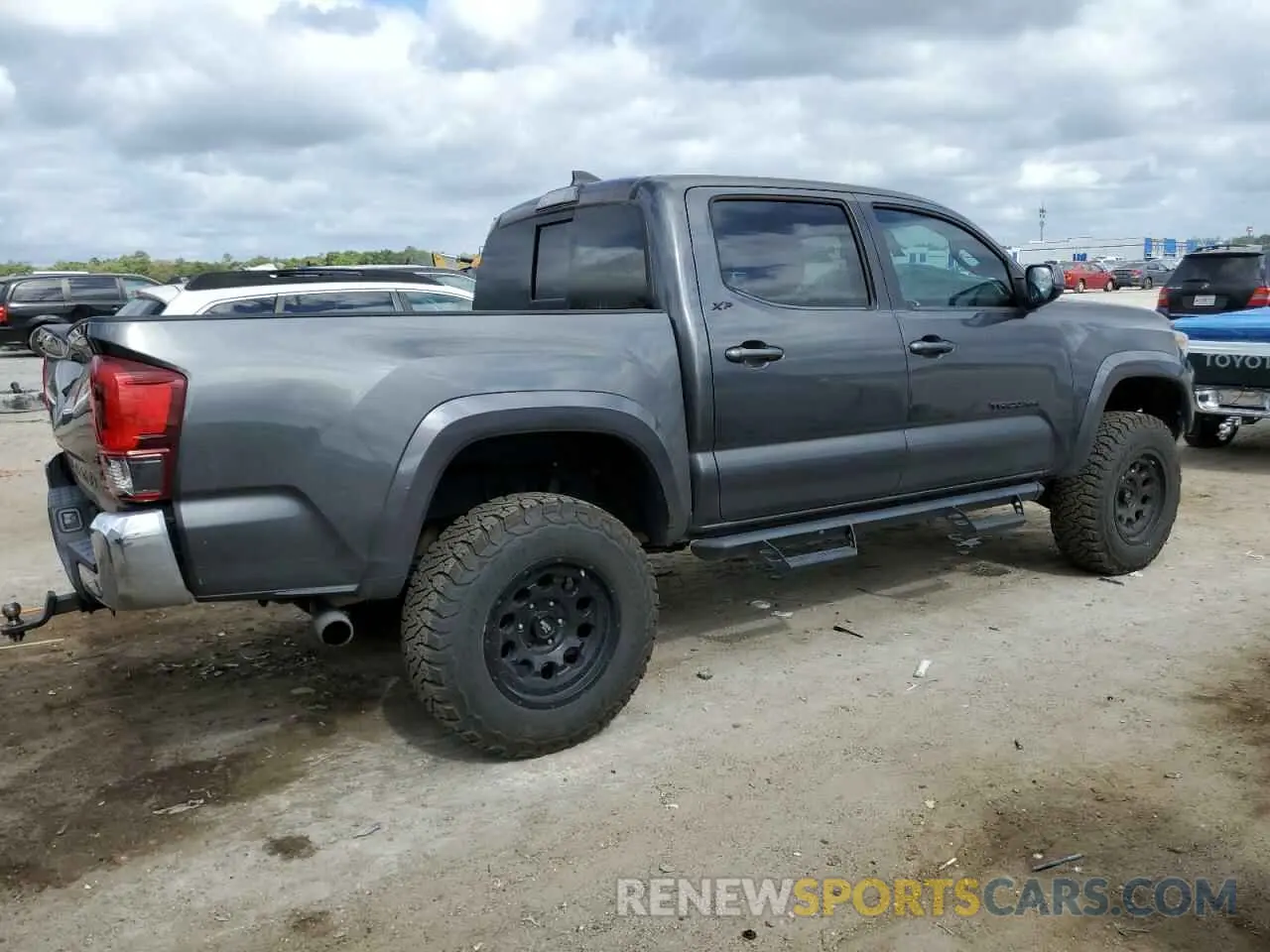3 Photograph of a damaged car 3TMAZ5CN7KM082324 TOYOTA TACOMA 2019