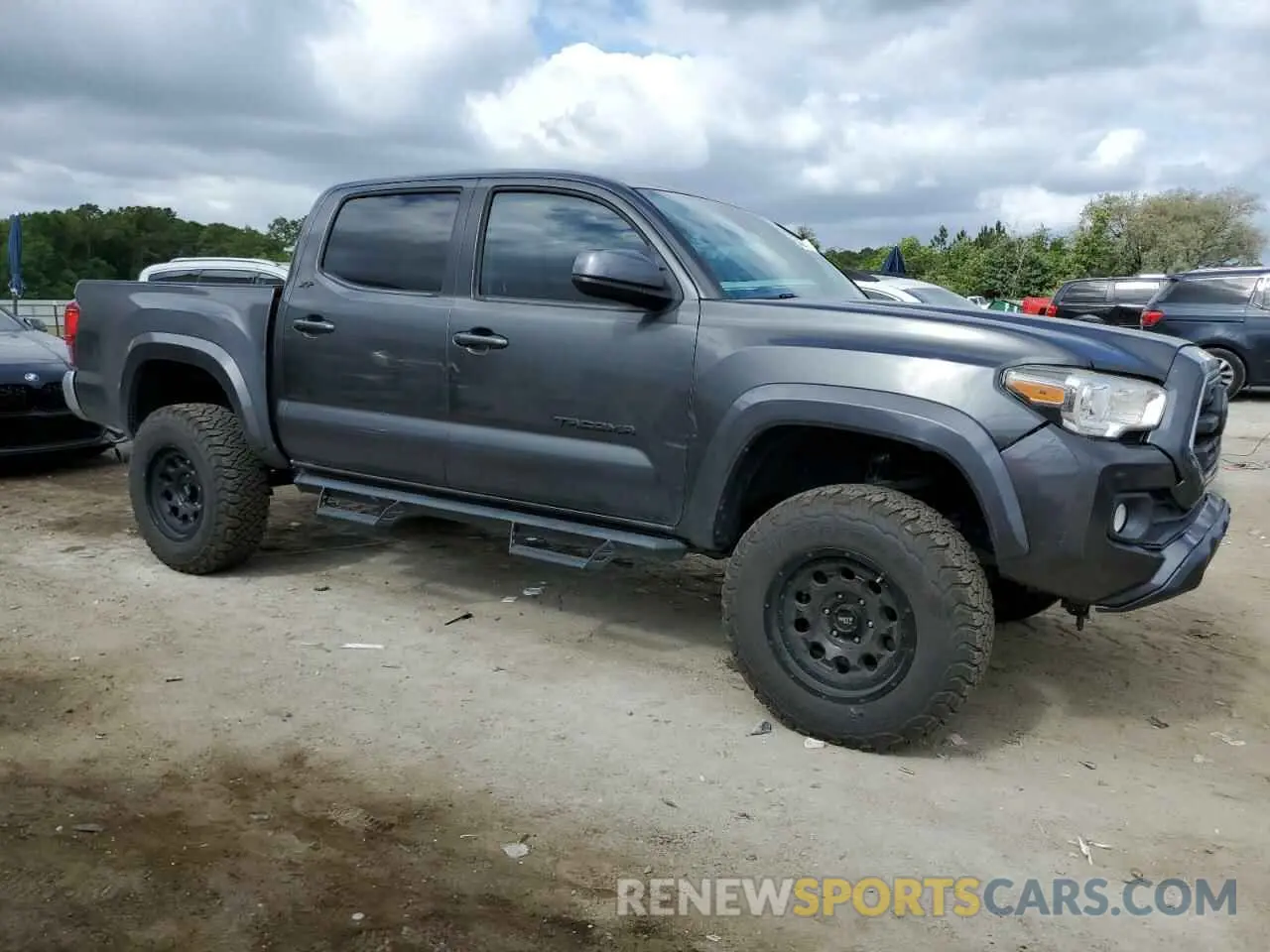 4 Photograph of a damaged car 3TMAZ5CN7KM082324 TOYOTA TACOMA 2019