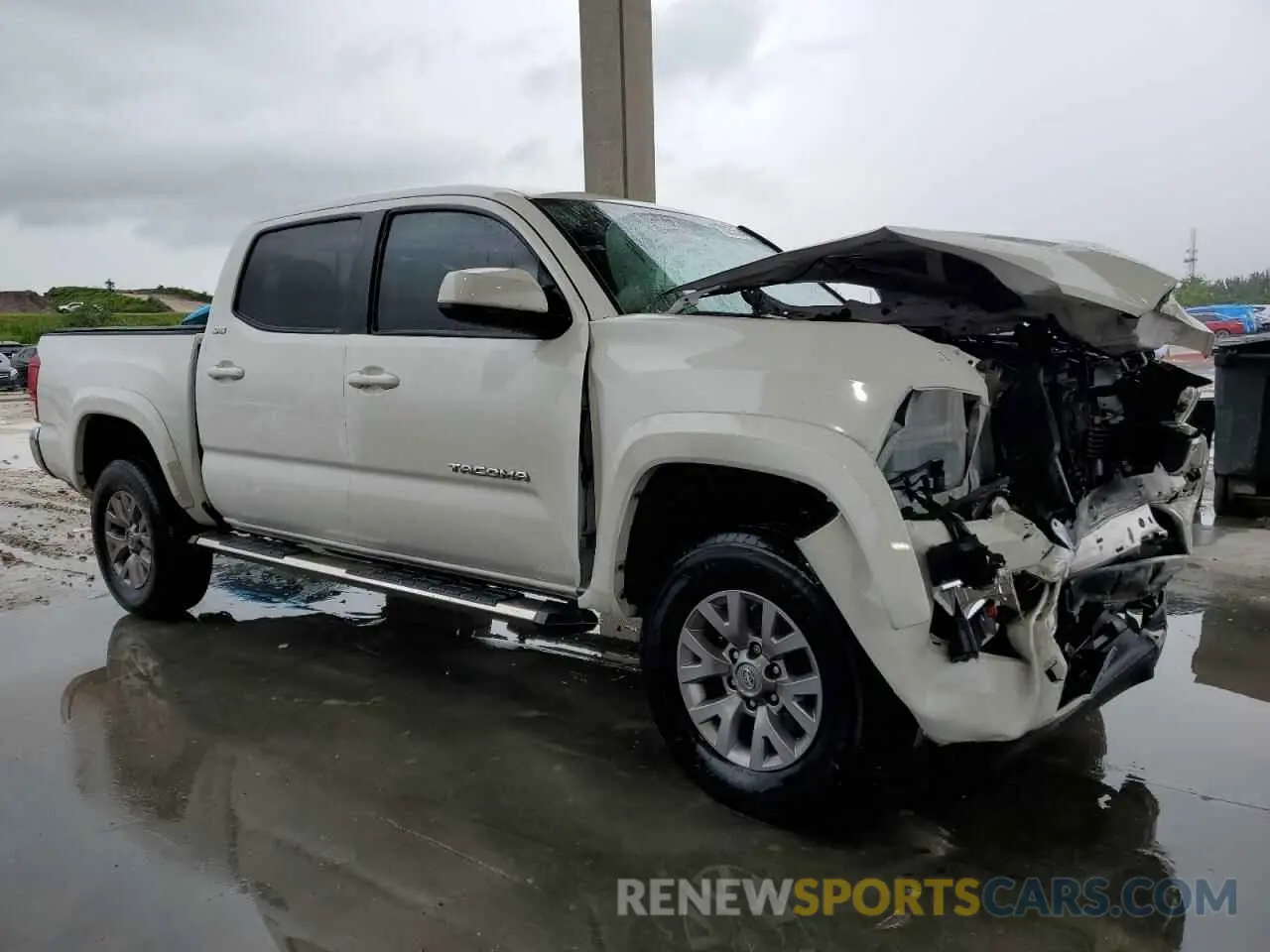 4 Photograph of a damaged car 3TMAZ5CN7KM085711 TOYOTA TACOMA 2019