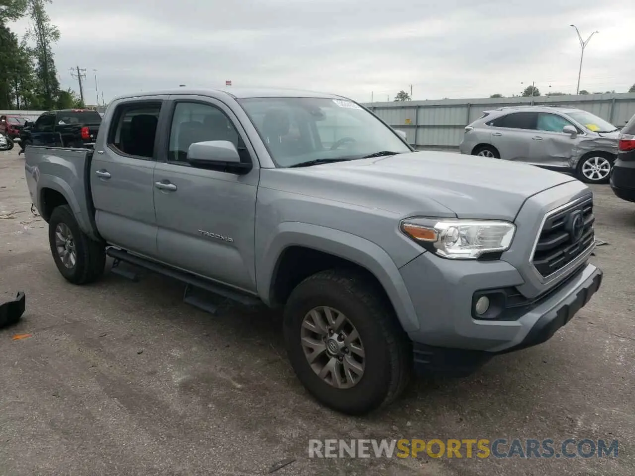 4 Photograph of a damaged car 3TMAZ5CN7KM105679 TOYOTA TACOMA 2019