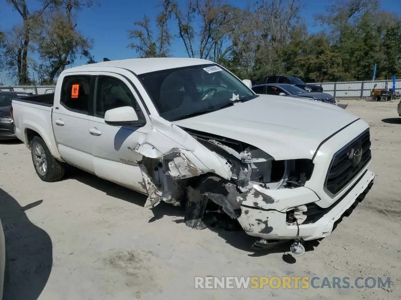 4 Photograph of a damaged car 3TMAZ5CN7KM109697 TOYOTA TACOMA 2019
