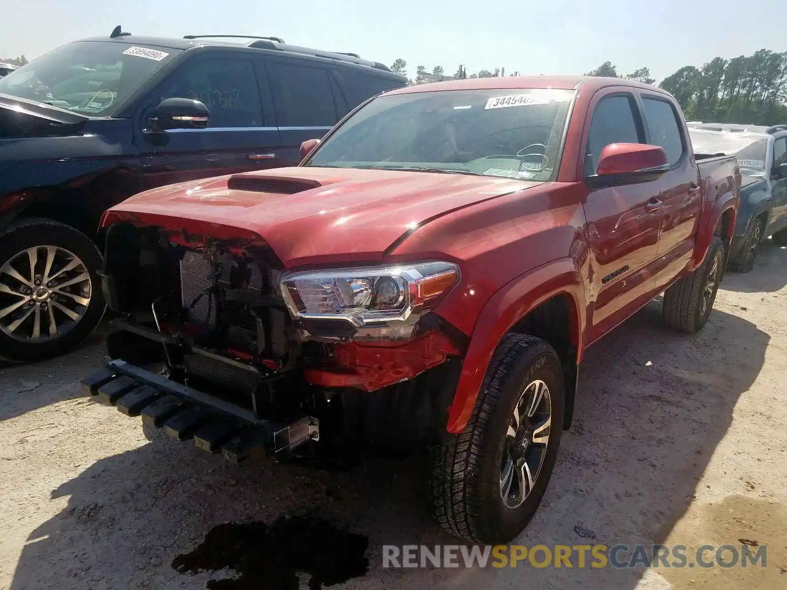 2 Photograph of a damaged car 3TMAZ5CN8KM093655 TOYOTA TACOMA 2019