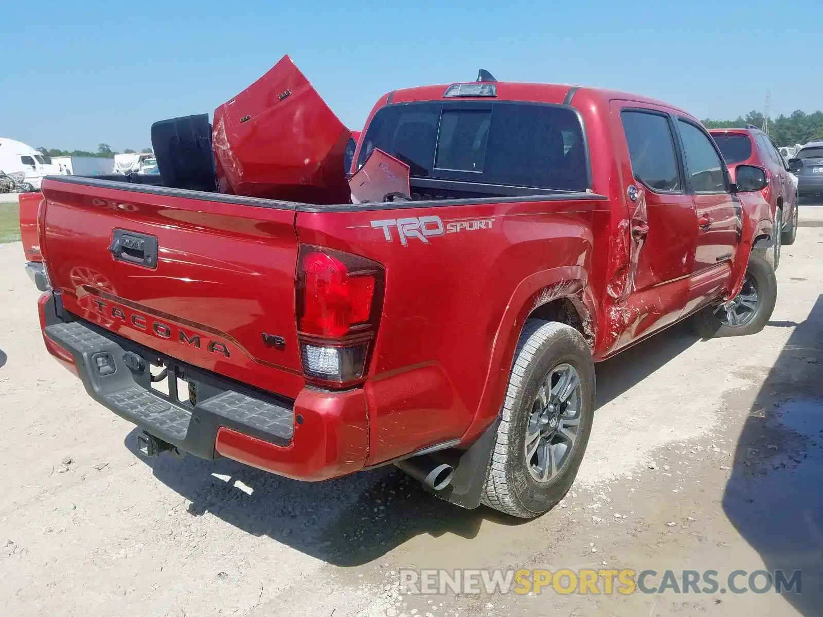 4 Photograph of a damaged car 3TMAZ5CN8KM093655 TOYOTA TACOMA 2019