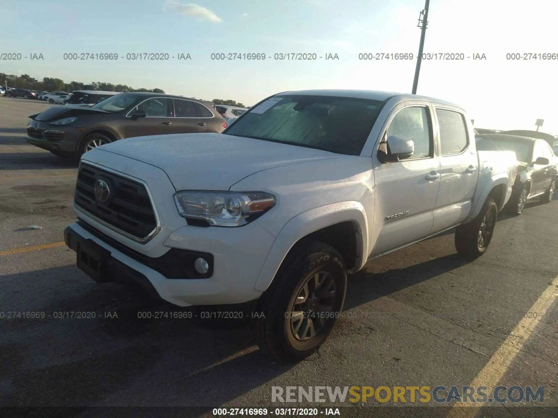 2 Photograph of a damaged car 3TMAZ5CN8KM094143 TOYOTA TACOMA 2019