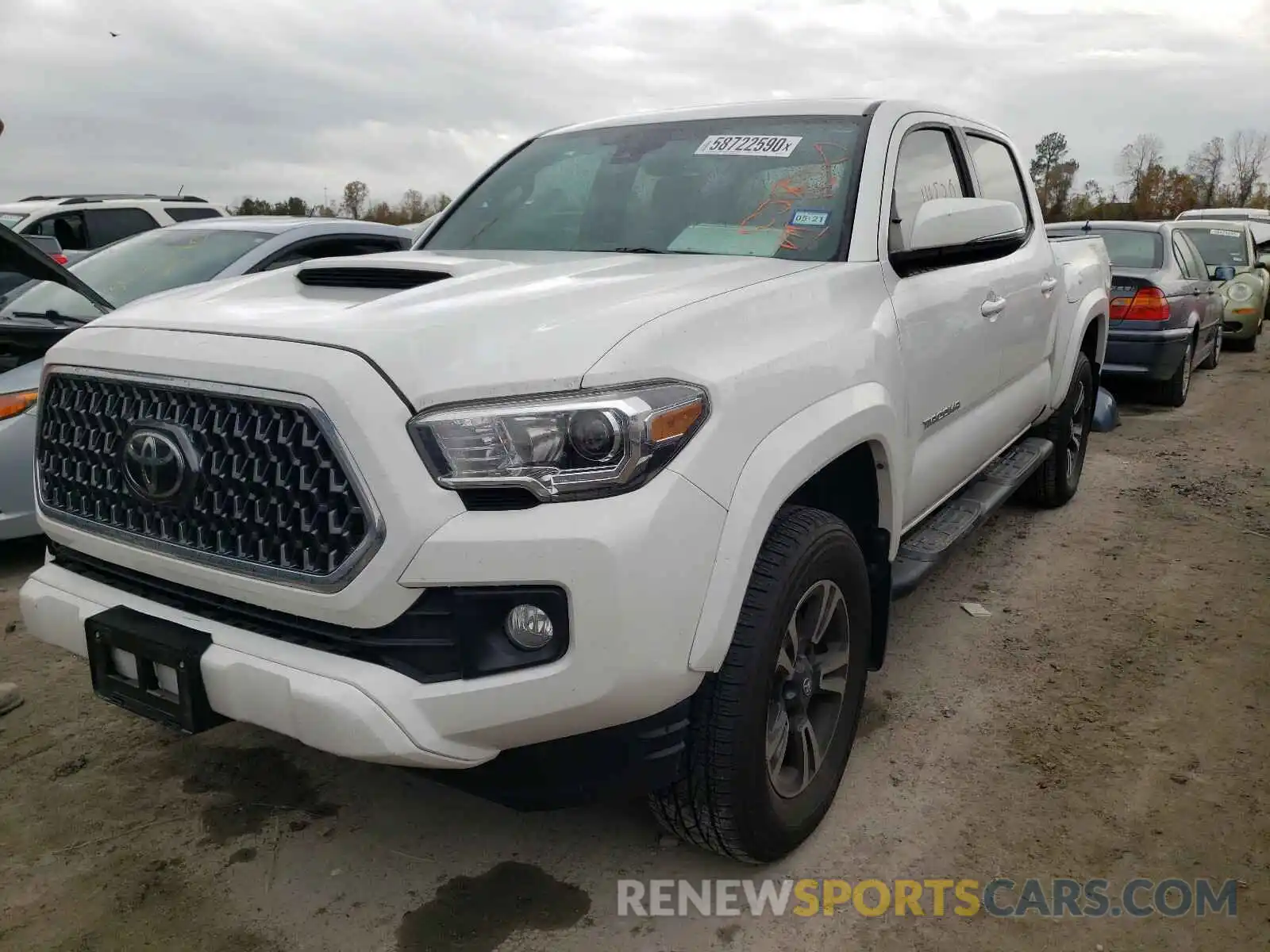 2 Photograph of a damaged car 3TMAZ5CN8KM100474 TOYOTA TACOMA 2019