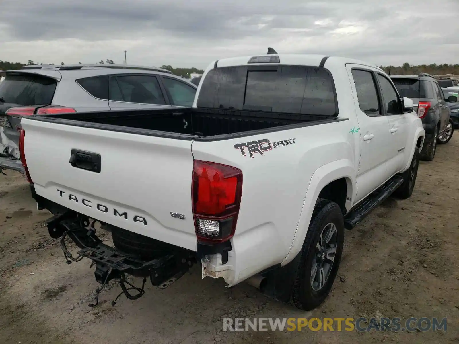 4 Photograph of a damaged car 3TMAZ5CN8KM100474 TOYOTA TACOMA 2019