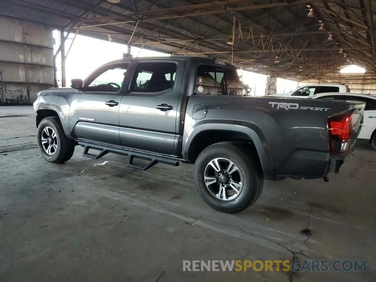 2 Photograph of a damaged car 3TMAZ5CN8KM100992 TOYOTA TACOMA 2019
