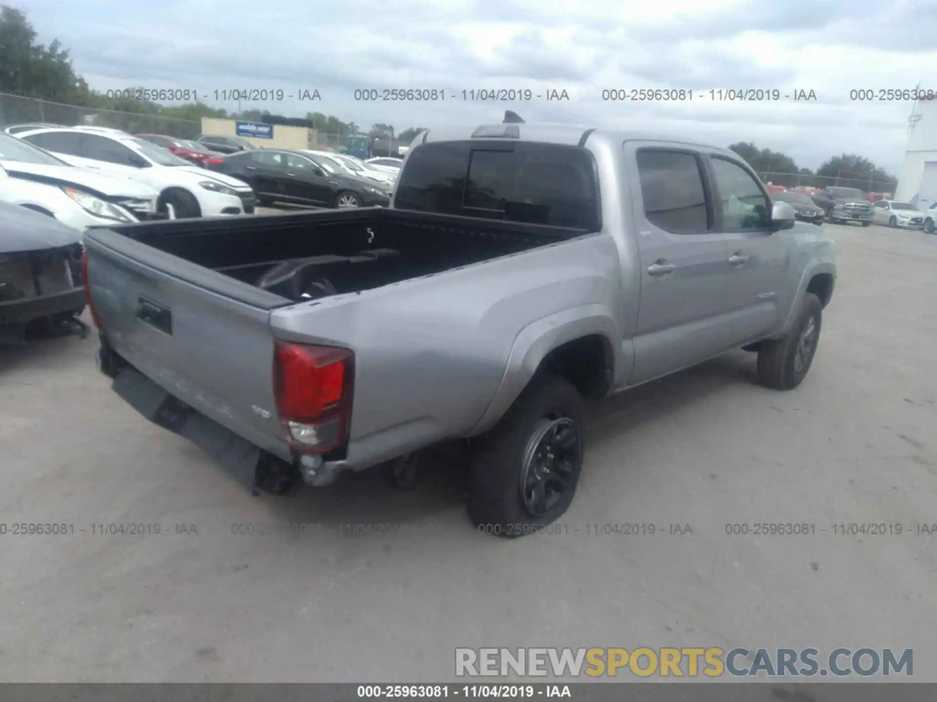 4 Photograph of a damaged car 3TMAZ5CN8KM104962 TOYOTA TACOMA 2019