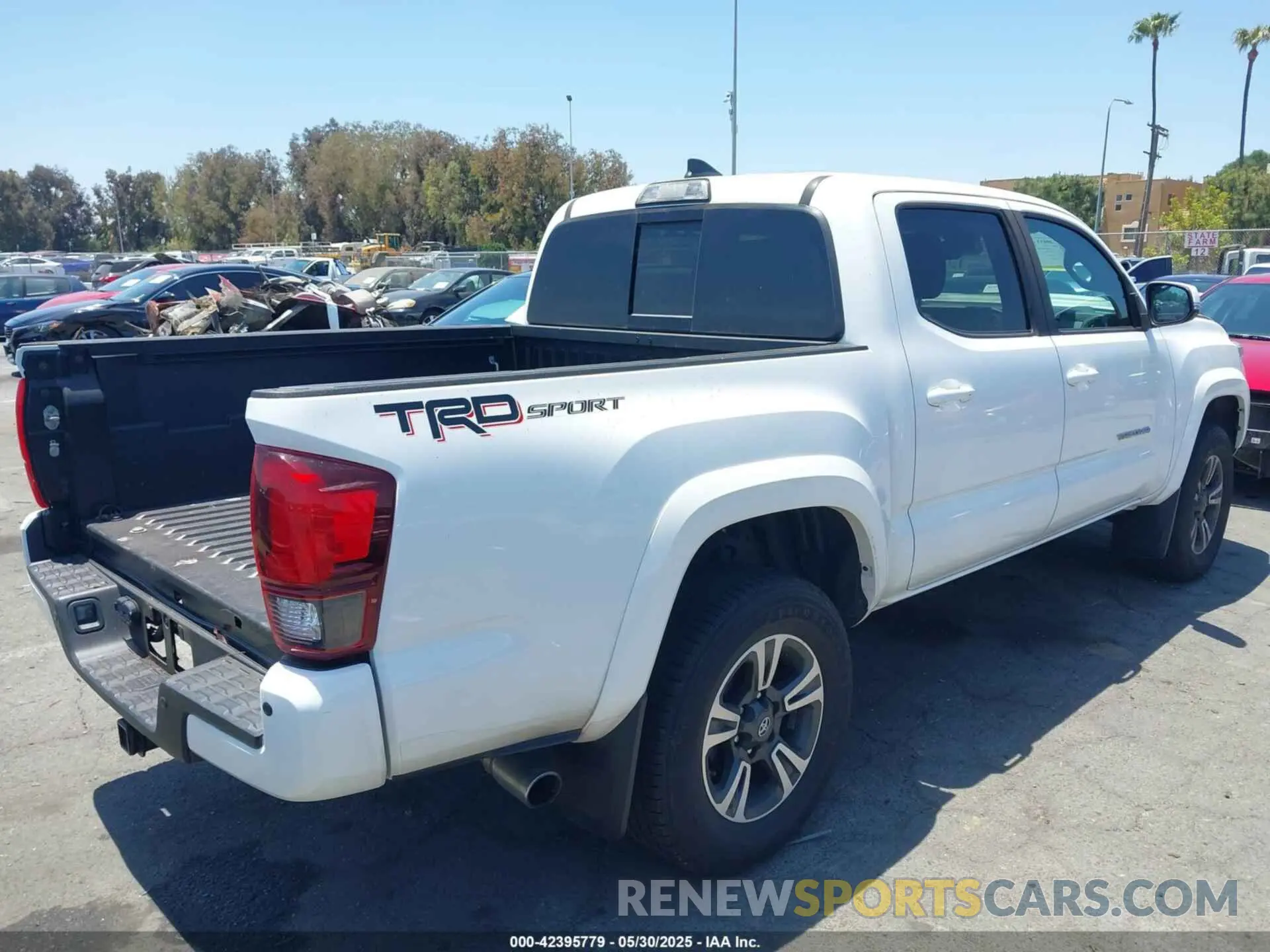 4 Photograph of a damaged car 3TMAZ5CN8KM105691 TOYOTA TACOMA 2019