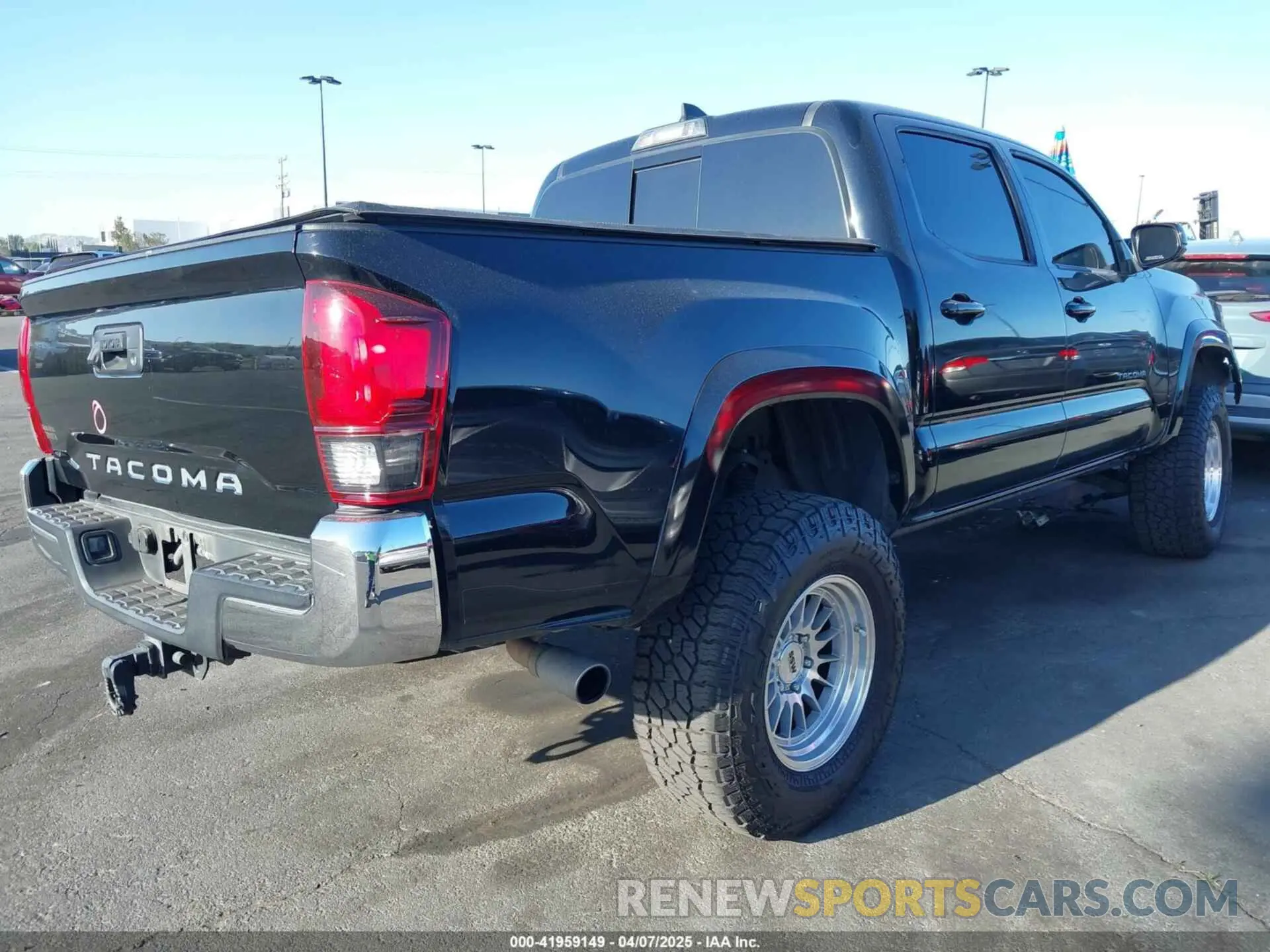 4 Photograph of a damaged car 3TMAZ5CN8KM110695 TOYOTA TACOMA 2019